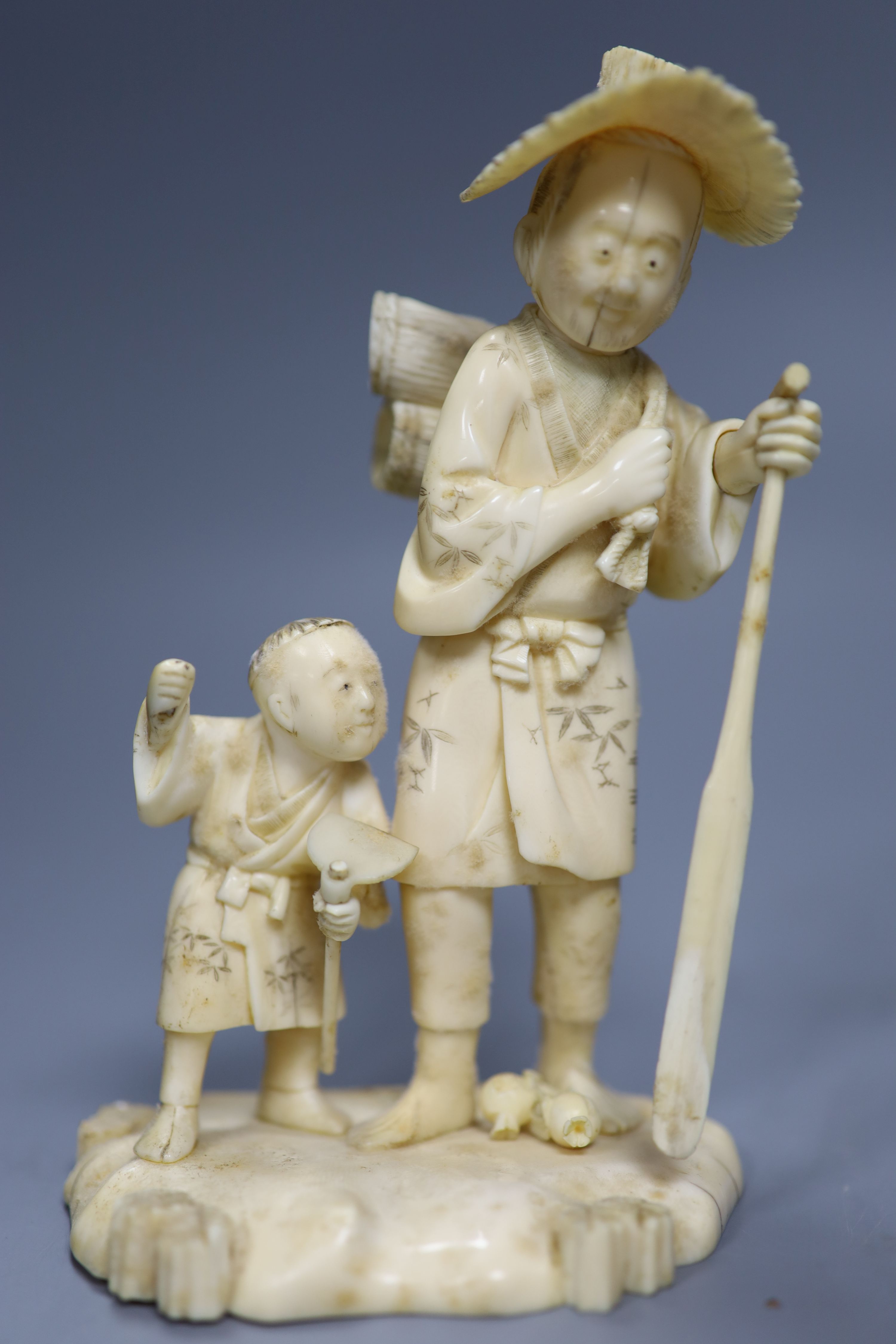 Four 19th century Japanese carved ivory figures, tallest 21cm